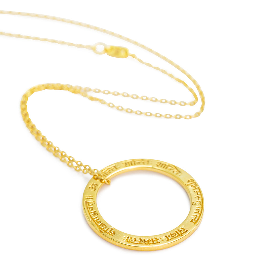 Mangala mantra pendant in a classic ring shape made of gold plated sterling silver by Eternal Bliss from the Yoga jewelery collection