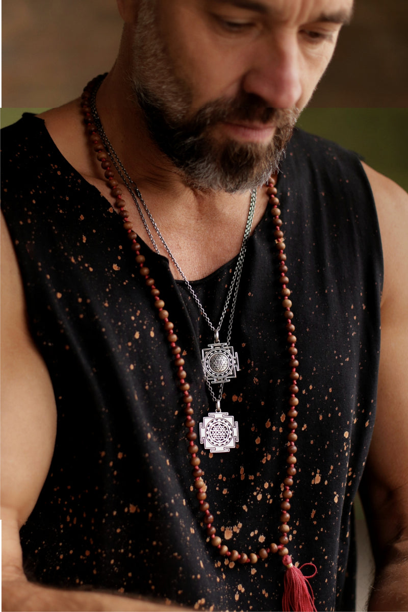 Spiritual jewelry: Valentin, a yoga teacher in Leipzig, wears various necklaces from the Sri Yantra collection