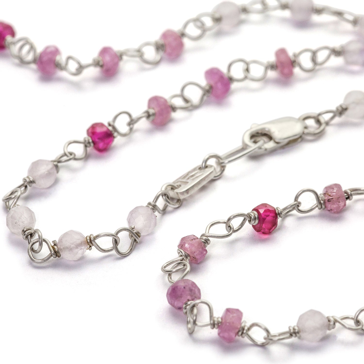 Detail of gemstone necklace "Sakura" made of high-quality sterling silver with ruby, rock crystal and lavender by Eternal Bliss